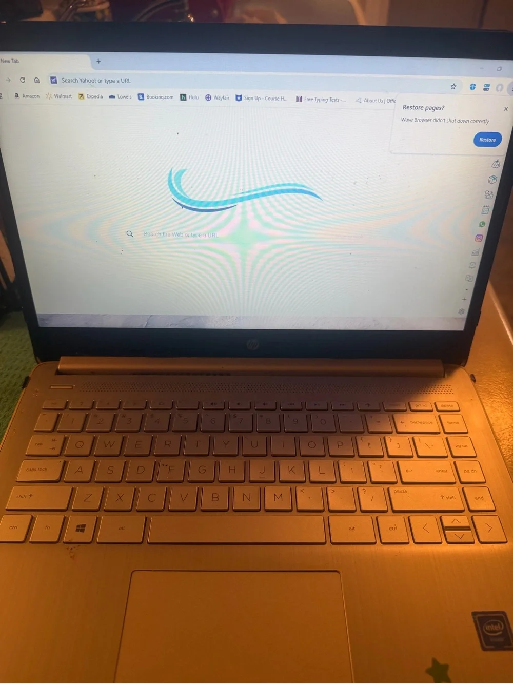 HP Silver Laptop with Blue Boot Screen